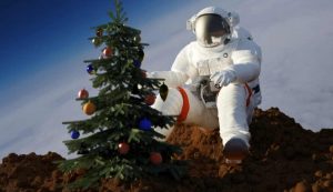 Astronauta con albero di Natale